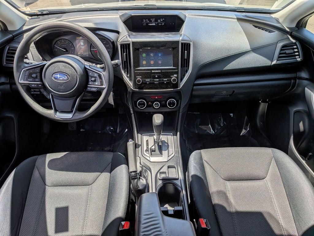 A used white Subaru Crosstrek on the pre-owned lot at Dalton Subaru National City