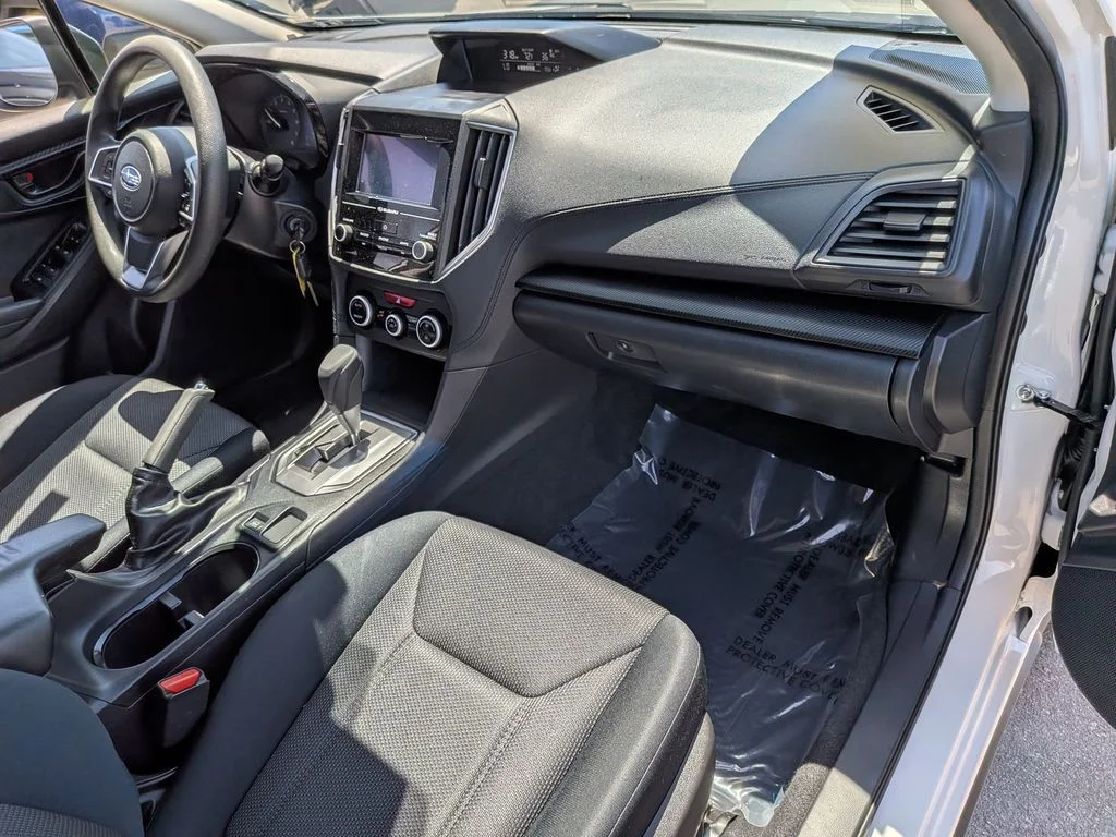 A used white Subaru Crosstrek on the pre-owned lot at Dalton Subaru National City